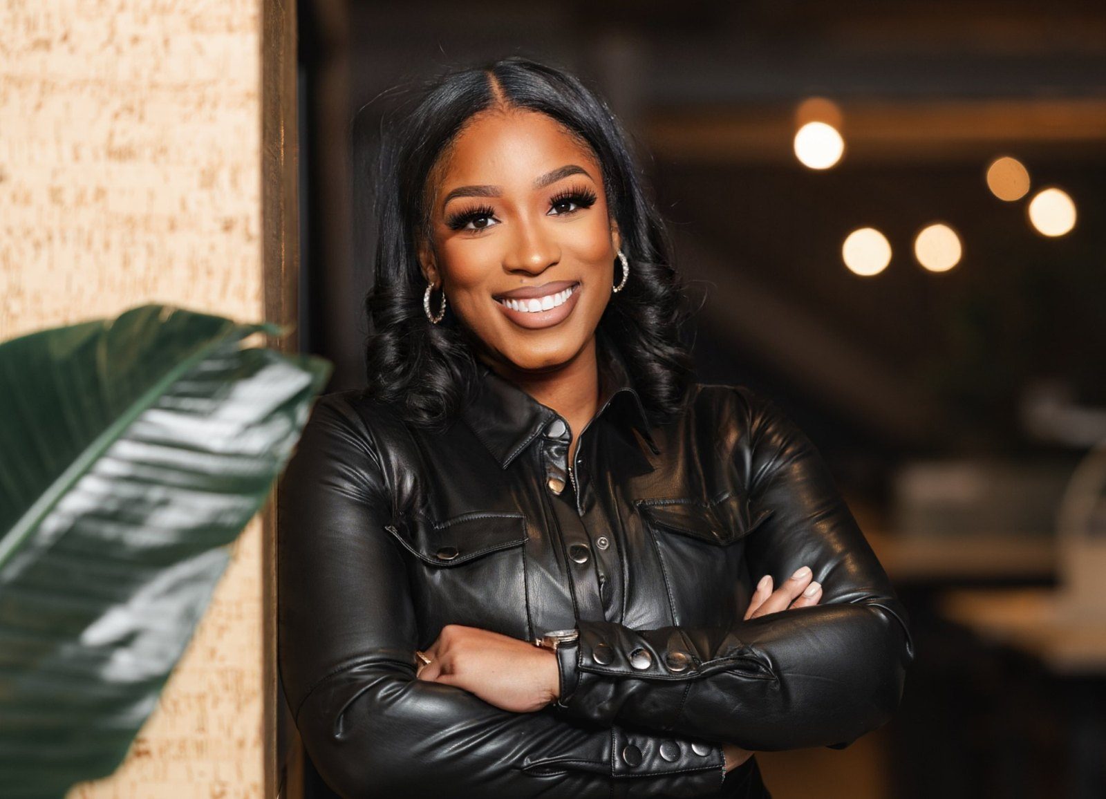 Brittany Mobley, founder of Culturit, with arms crossed in a black leather shirt